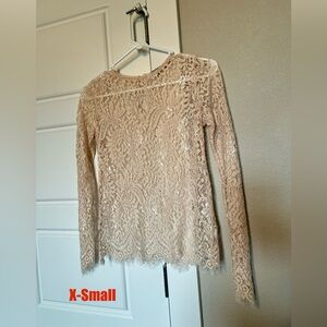 Lace long sleeve top. Light peach color.